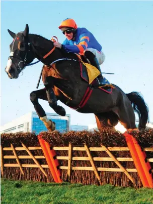  ?? PA WIRE ?? Mick Jazz, with Davy Russell up, on the way to winning the Ryanair Hurdle at Leopardsto­wn yesterday