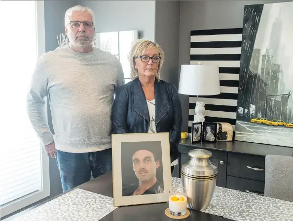  ?? BRANDON HARDER ?? Wayne Wakelam and Jenny Churchill with a photo of their son, Jordan Wakelam, who struggled with opioid addiction and died Jan. 27 of a suspected fentanyl overdose.