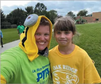  ?? PHOTO COURTESY OF TIFFANY VOSBURG ?? Royal Oak parent and middle school PTSA President Tiffany Vosburg, left, with her daughter, Heather, back in 2021, says she has already talked to both her children about the dangers of vaping.