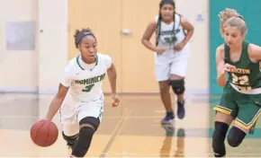  ?? C.T. KRUGER/NOW NEWS GROUP ?? Dominican senior guard Jazmine Young (left) was averaging 19.2 points per game entering play Tuesday night.