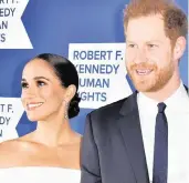  ?? ANGELA WEISS /AFP/TNS ?? Meghan Markle, left, and Prince Harry arrive at the Robert F. Kennedy Human Rights Ripple of Hope Award Gala at the Hilton Midtown in New York on Dec. 6, 2022.