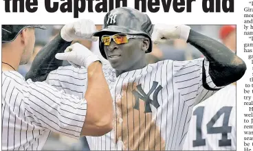  ??  ?? YES, SIR: Didi Gregorius celebrates with Matt Holliday after his second-inning homer, his 24th of the season, tying Derek Jeter’s franchise mark for a shortstop.