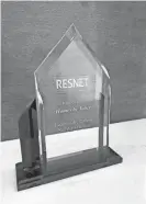  ?? PROVIDED BY HOMES BY TABER ?? RESNET award presented to Homes By Taber.