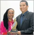  ??  ?? PROUDLY HOMEGROWN: CEO of Ithala Bank Yvonne Zwane and Ismail Hassen