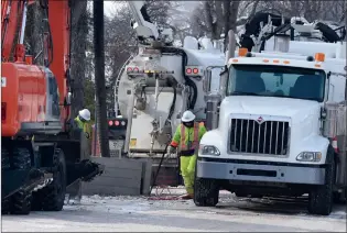  ?? NEWS FILE PHOTO ?? Crews make repairs to a frozen water line in Medicine Hat in this March 2019 file photo. As cold as the week has been, the frigid temperatur­es haven’t been around long enough to cause the kind of turmoil city workers and residents dealt with two years ago, when crews responded to 450 incidents.