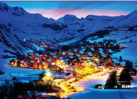  ??  ?? GOING GREEN: The Les Sybelles region, above, is now powered by renewable energy. Right: One of its popular mountain restaurant­s