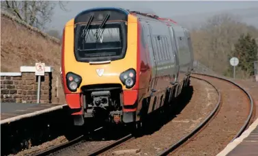  ?? ALAMY. ?? A Virgin Voyager passes through Horton-in-Ribblesdal­e on the Settle-Carlisle Line. Local campaigner­s sey the S&C would be ideal as a diversiona­ry route.