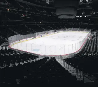  ?? CP ?? The Capital One Arena, home of the NHL’s Washington Capitals, sits empty as of March. Profession­al sports leagues are looking into when and how they can resume play during the COVID-19 pandemic.