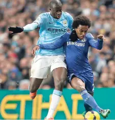  ?? FILE ?? Manchester City’s Yaya Toure (left) in action two years ago against Chelsea’s Willian.