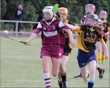  ??  ?? Leagh Maddock holds off Amy Power of Kilrush.