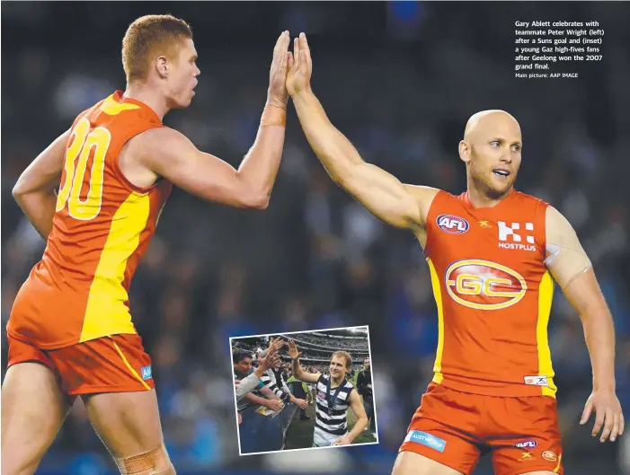  ?? Main picture: AAP IMAGE ?? Gary Ablett celebrates with teammate Peter Wright (left) after a Suns goal and (inset) a young Gaz high-fives fans after Geelong won the 2007 grand final.