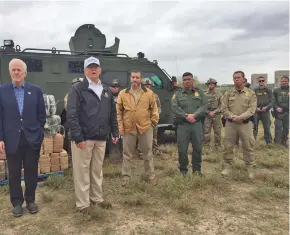  ??  ?? President Donald Trump (second from left) visits a border patrol station in McAllen, in the Rio Grande Valley of Texas.