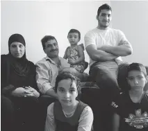  ?? EVELYN HARFORD ?? Wael Aun and his wife Wafaa Aon and their four children, who came to Canada as refugees this February.