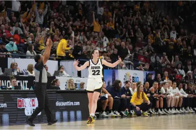  ?? (AP Photo/ Abbie Parr) ?? Iowa guard Caitlin Clark (22) celebrates after making a 3-point basket Saturday during the first half of an NCAA college basketball game against Michigan in the semifinals of the Big Ten women’s tournament in Minneapoli­s.