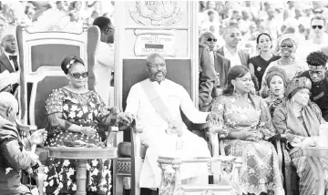  ??  ?? Weah (centre), the country’s former President Ellen Johnson Sirleaf (right), the country’s new Vice-President Jewel Taylor (left) and Weah’s wife Clar Weah attend Weah’s swearing-in ceremony in Monrovia. — AFP photo