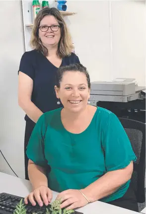  ?? ?? MAX Solutions Innisfail staff members Natalie Calleja (front) and Tanya Holst have been commended by the federal government for their work with people with a disability.