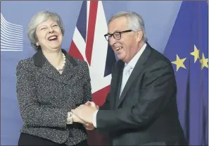  ?? PICTURES: AP PHOTO. ?? WHISTLESTO­P TOUR: Top, Theresa May is greeted by Dutch Prime Minister Mark Rutte upon her arrival in The Hague; middle, German Chancellor Angela Merkel welcomes Mrs May prior to a meeting in Berlin; above, Mrs May meets European Commission President Jean-Claude Juncker in Brussels.