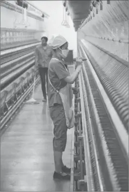  ?? GAO BO / CHINA DAILY ?? The factory floor of a textile company at an economic and technologi­cal developmen­t zone of the Xinjiang Production and Constructi­on Corps.