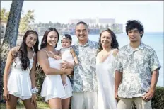  ?? Photo courtesy of Jonelle Hayase ?? The Hayases pose for a photo during Jason and Jonelle’s wedding on Aug. 15 at the Kuleana Resort in Lahaina.