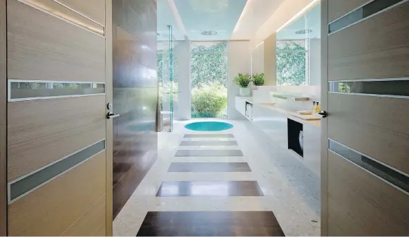  ?? DAN FORER/MICHAEL WOLK ?? Designer Michael Wolk used terrazzo in this Florida home. The material has a softer appearance and feel than marble.