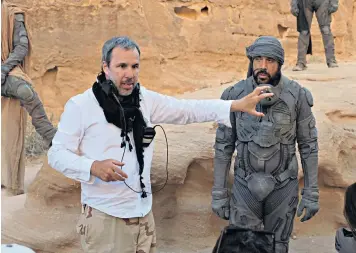  ?? ?? iAnd… cut! Canadian director Denis Villeneuve and Javier Bardem as Stilgar on the set of Dune in Jordan