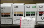  ?? SETH WENIG — ASSOCIATED PRESS ?? Juul announced it will voluntaril­y stop selling its fruit and dessert-flavored vaping pods.