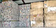  ?? Lynn Atkins/The Weekly Vista ?? Crushed aluminum cans are baled and wait by bales of cardboard. Because the price of cardboard is so low, the bales may wait a while for pickup.