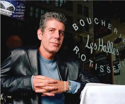  ?? AP FILES ?? Anthony Bourdain sits at one of the tables in his New York City restaurant in 2001.