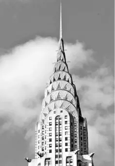  ?? — Reuters photo ?? The Lexington Avenue side of New York City’s iconic Chrysler Building that was opened in 1930 on East 42nd Street is seen in Manhattan, New York.