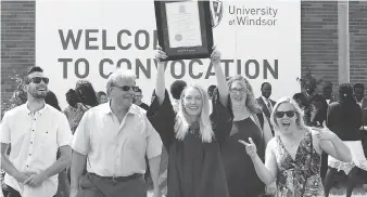  ?? NICK BRANCACCIO ?? University of Windsor graduate Kyra Wardell, centre, celebrates with boyfriend Zach Farina, left, father Kevin Wardell, mother Tina Wardell and sister Sydney Boersma, right, Wednesday.