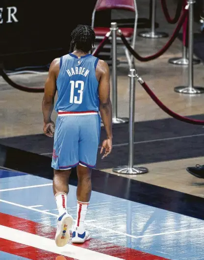  ?? Mark Mulligan / Staff photograph­er ?? James Harden walks off the Toyota Center floor, where he later expressed his frustratio­n with the Rockets’ latest defeat.