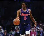  ?? MATT SLOCUM - THE ASSOCIATED PRESS ?? Sixers guard Tyrese Maxey brings the ball up during a game Wednesday against the Pistons at Wells Fargo Center.