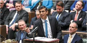  ?? ?? Pressure mounting: Sunak speaking at the House of Commons in London. He is facing a difficult time managing an unruly Conservati­ve Party. — Reuters