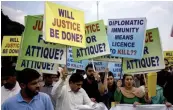  ?? — AP ?? ◗ Pakistani protesters demand the trial of American diplomat involved in a vehicle crash that killed a person.