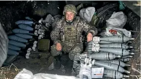  ?? AP ?? A Ukrainian soldier among stacks of mortar bombs in a dugout at the front line in Bakhmut, in Ukraine’s Donetsk region. Russian forces have been retreating in areas the Kremlin claims to have annexed.