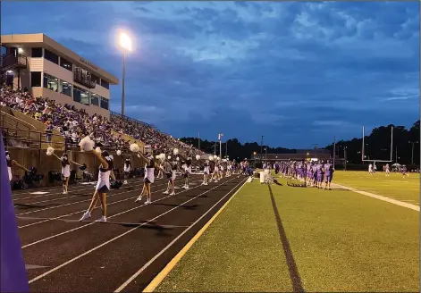  ?? Tab Bledsoe/Special to the News-Times ?? Friday night: Spectators look on as El Dorado takes on Cabot at Memorial Stadium last week. Tonight, El Dorado hits the road to take on Magnolia. Other games involving Union County teams feature Parkers Chapel hosting Magnet Cove and Strong visiting Drew Central.