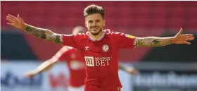  ??  ?? Jamie Paterson celebrates scoring for Bristol City against Coventry