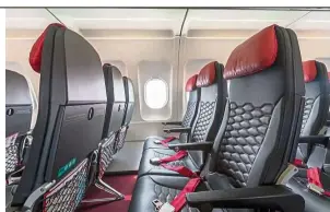  ??  ?? The new seat is lighter, and is expected to help AirAsia reduce fuel consumptio­n by more than 70,000 litres. — AirAsia