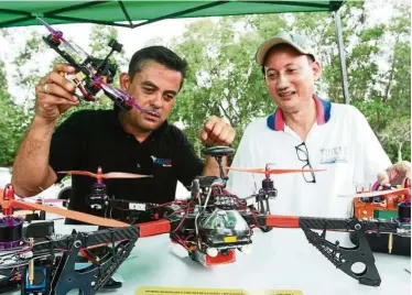  ?? — RAYMOND OOI/The Star ?? Adam (left) and Alvisse believe that drone racing is a sport worth following, as it could take the pilot places and put Malaysia on the drone racing map.