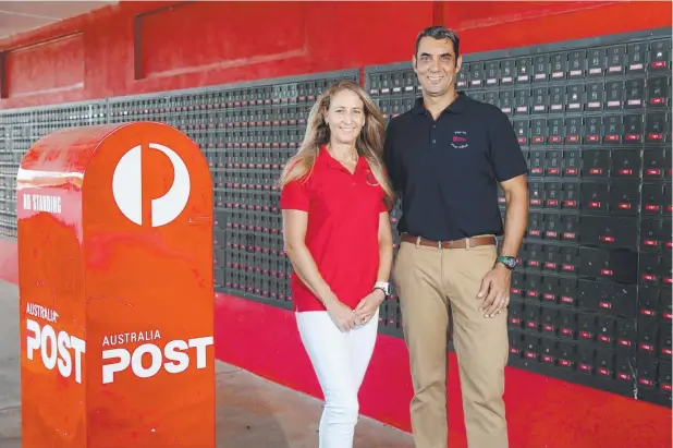  ?? Picture: STEWART McLEAN ?? NEW OWNERS: Former Gold Coast couple Jennifer and Chris Chastre have bought the Edge Hill Post Office.