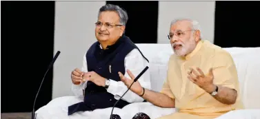  ??  ?? Raman Singh with Prime Minister Narendra Modi. The state government has always worked in synergy with Central schemes.