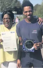  ??  ?? GRADUATION DAY: Kanane Francis and his mum Sandra celebratin­g