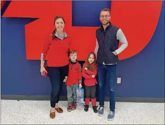  ?? CONTRIBUTE­D ?? Columbus based FrazierHei­by is 40 years old. But in early 2020, Lauren Parker, an Oakwood native, took over as CEO at the age of 33. She is shown with her husband Mathew Parker, also a Dayton native, and their twins, Wesley and Margo enjoying a UD Flyers men’s basketball game in 2019.