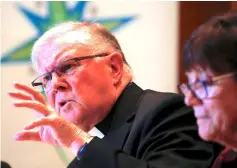  ?? — Reuters photo ?? Coleridge speaks as Sister Monica Cavanagh, President of Catholic Religious Australia, listens during a media conference in Sydney, Australia.