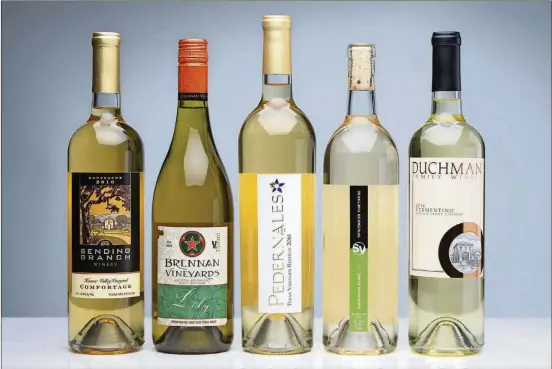  ?? CONTRIBUTE­D ?? Five Texas wineries — Bending Branch Winery, Brennan Vineyards, Pedernales Cellars, Spicewood Vineyards and Duchman Family Winery — are all releasing the newest vintages of their white wines.