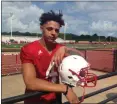  ?? JOHN KAMPF — FOR THE NEWS-HERALD ?? Devon Holbert takes a break during the first day of practice at Perry on Aug. 1.