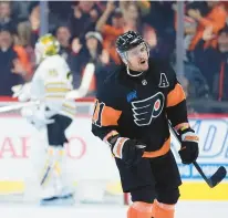  ?? MATT SLOCUM/AP ?? The Flyers’ Travis Konecny reacts after scoring against the Bruins in the third period on Saturday in Philadelph­ia.