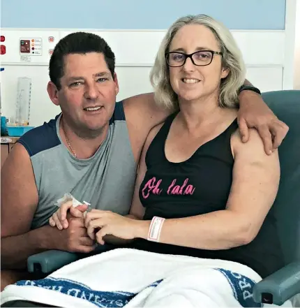  ??  ?? GOOD PROGRESS: Justine Barwick, of Burnie, with her husband Craig at the Royal Brisbane and Women’s Hospital.