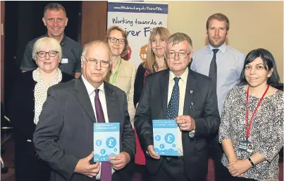  ?? Picture: Gareth Jennings. ?? Councillor­s David Alexander and David Ross, front, with speakers Norma Philpott, Professor John McKendrick, Stephanie Protnikoff, Conduit Scotland, Dr Margaret Hannah, of NHS Fife, Euan Halliday, of DWP, and Anne Hinojosa.