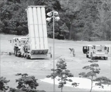  ?? Kim Jun-beom Associated Press ?? THAAD trucks carry and fire missiles designed to intercept hostile projectile­s. The U.S. publicly deployed two in Seongju county, but South Korea’s president was “shocked” to know four more launchers had been deployed.